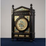 LATE VICTORIAN EBONISED MANTEL CLOCK IN AESTHETIC TASTE, the dial with arabic numerals and