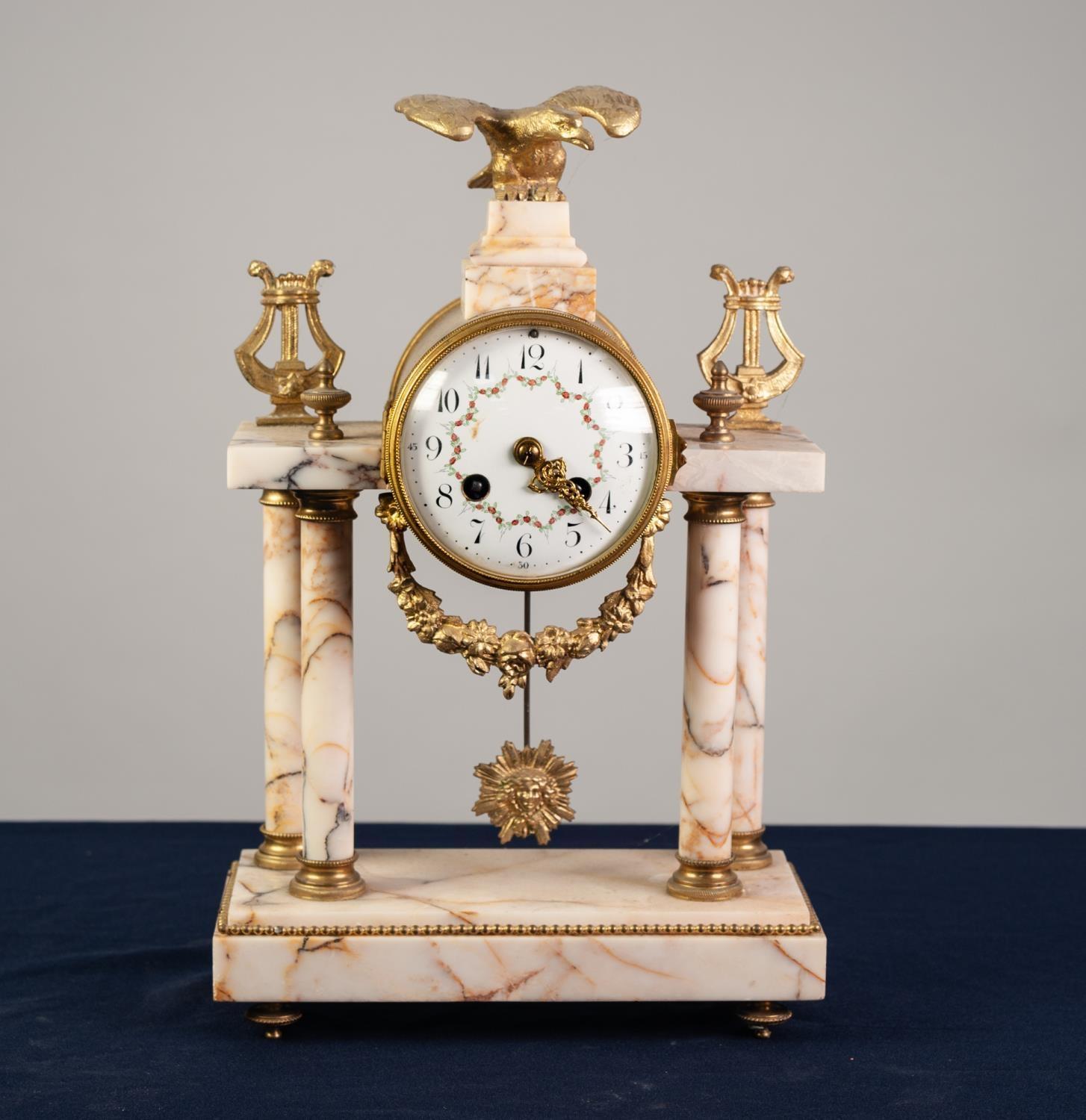 LATE 19th/EARLY 20th CENTURY FRENCH VEINED MARBLE AND GILT METAL MOUNTD PORTICO CLOCK, the drum