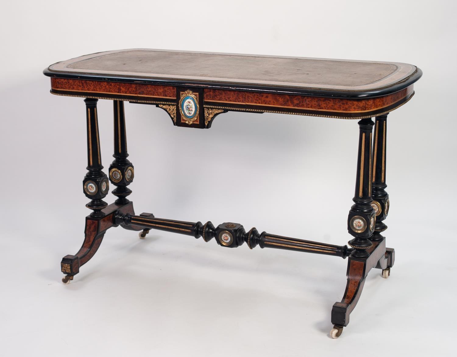 MID VICTORIAN FRENCH STYLE AMBOYNA INLAID, GILT METAL MOUNTED AND PARCEL EBONISED WRITING TABLE WITH