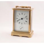 20th CENTURY FRENCH CORNICHE CASED BRASS ALARUM CARRIAGE CLOCK, the white enamel dial with roman