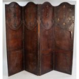 EARLY TWENTIETH CENTURY EMBOSSED LEATHER ON STAINED PINE, FOUR FOLD SCREEN, each leaf with arch