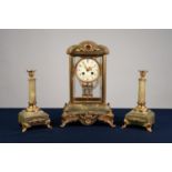 CIRCA 1900 FRENCH GREEN ONYX GILT BRASS AND GILT SPELTER MOUNTED CLOCK GARNITURE, the movement