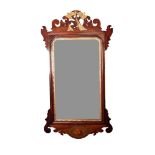 EARLY TWENTIETH CENTURY GEORGIAN STYLE INLAID AND CARVED MAHOGANY WALL MIRROR, the bevel edged