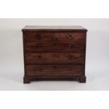 GEORGE III MAHOGANY CHEST OF DRAWERS, the moulded oblong top above two short and three long
