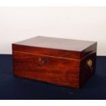 VICTORIAN LINE INLAID AND CROSSBANDED MAHOGANY BOX, of oblong form with brass lion mask captive ring