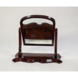 EARLY NINETEENTH CENTURY FIGURED MAHOGANY LARGE TOILET MIRROR, the arch topped plate in a