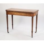 GEORGE III ROSEWOOD CROSSBANDED FIGURED MAHOGANY FOLD-OVER CARD TABLE, the rounded oblong flame