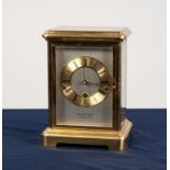 MODERN ?RAPPORT, LONDON? SPRING DRIVEN BRASS CASED FOUR GLASS MANTLE LOCK, of typical form, with