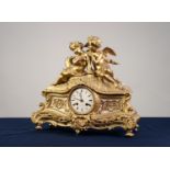 19th CENTURY FRENCH ORMOLU ALABASTER INSET CASED MANTEL CLOCK, the white enamel roman dial inscribed