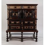 LATE SEVENTEENTH CENTURY TWO PART OAK AND BONE INLAID CHEST OF DRAWERS, the moulded oblong top above