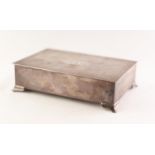 SILVER TABLE CIGARETTE BOX the slightly overset hinge lid having engine turned decoration and vacant