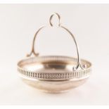 GEORGE V SILVER SWEET MEAT BOWL circular with fixed loop handle, balustrade open border, 5" (12.7)