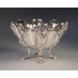 AN EDWARDIAN SILVER BOWL, in the Art Nouveau taste, of octafoil shape, the border cast with