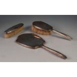 GEORGE VI THREE PIECE SILVER BACK DRESSING TABLE HAND MIRROR AND BRUSH SET, Birmingham 1941, (3)