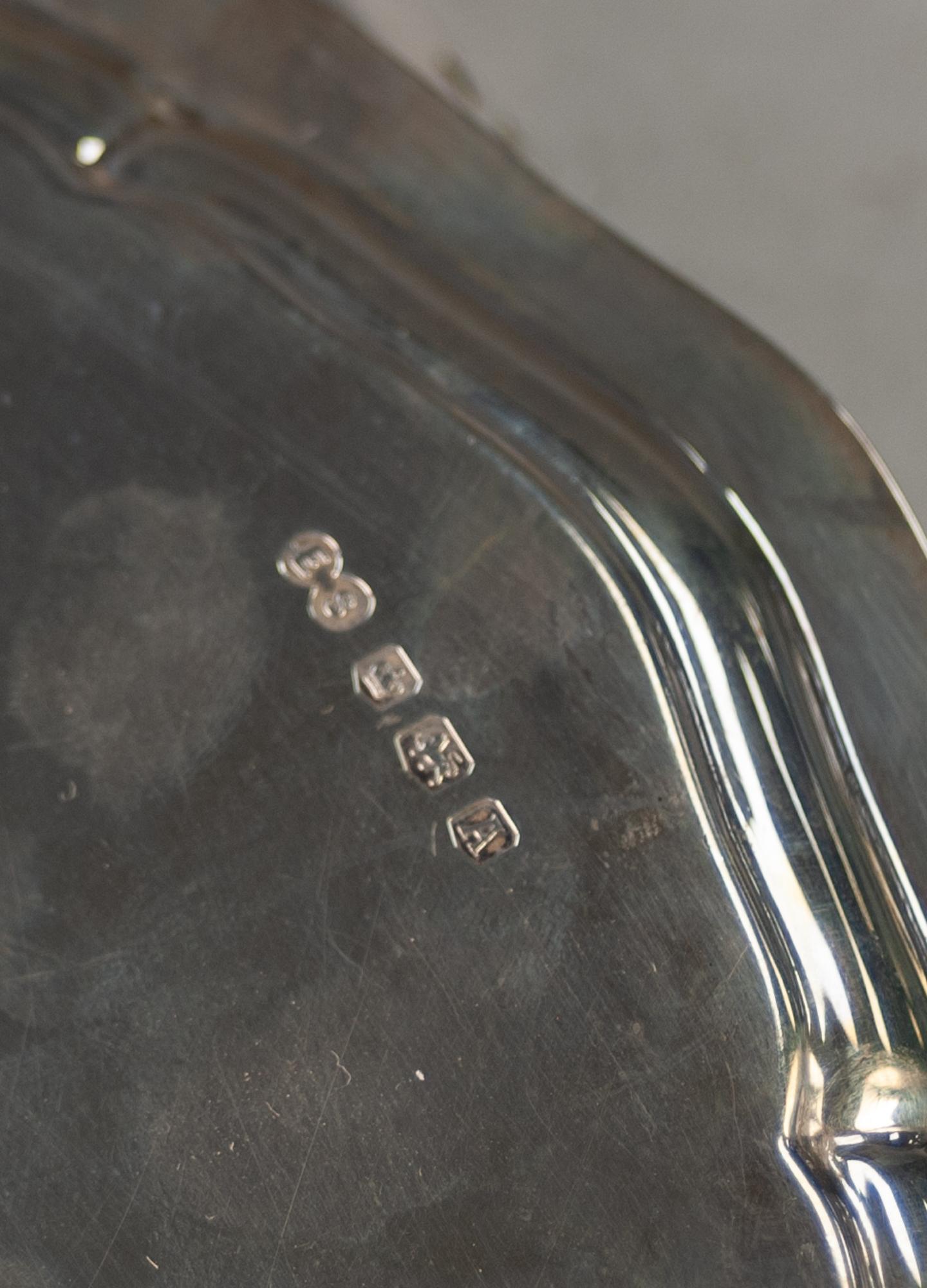 A TWENTIETH CENTURY SILVER WAITER, with leaf capped moulded border, standing on four inverted scroll - Image 3 of 3