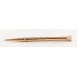 FOLIATE ENGRAVED PROPELLING PENCIL, stamped '9CT GOLD', 13.96g gross Good condition, some wear