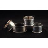 FOUR SILVER NAPKIN RINGS, various dates (4)