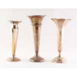 THREE VARIOUS WEIGHTED SILVER TRUMPET SHAPE VASES two having fluted form tops the larger vase