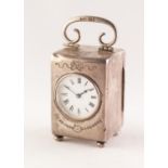 SMALL EDWARDIAN SILVER CASED TRAVEL CLOCK oblong with hinged double scroll loop handle the front