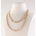 14k GOLD CONTINUOUS NECKLACE of long wound wire pattern long links, 32" long, 48.5gms