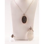 SILVER GILT LOCKET ON CHAIN, A CLEAR PLASTIC BOUQUET PENDANT AND A MARCASITE RING (3)