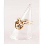 18ct GOLD TWO STRAND WIRE PATTERN RING with loose knot pattern top collet set with an old cut