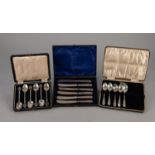 A CASED SET OF SIX TEA KNIVES, with filled silver handles, also a CASED SET OF SIX SILVER TEASPOONS,