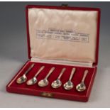 A CASED SET OF SIX SILVER 'BRITISH HALLMARKS' SPECIMEN TEASPOONS, 1952