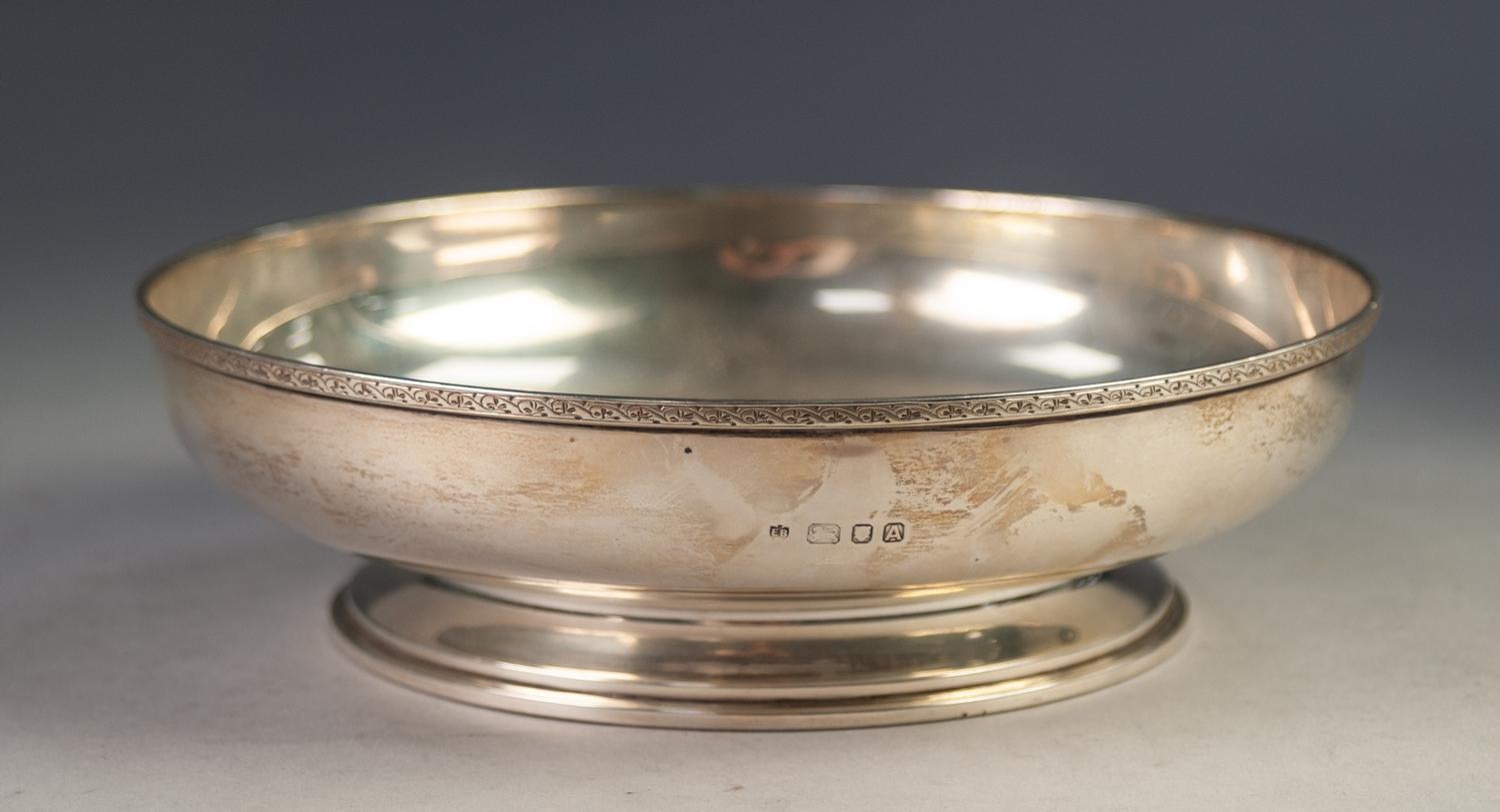 A PRE-WAR SILVER SHALLOW BOWL, on spreading foot, the rim with narrow engraved running scroll - Image 2 of 2