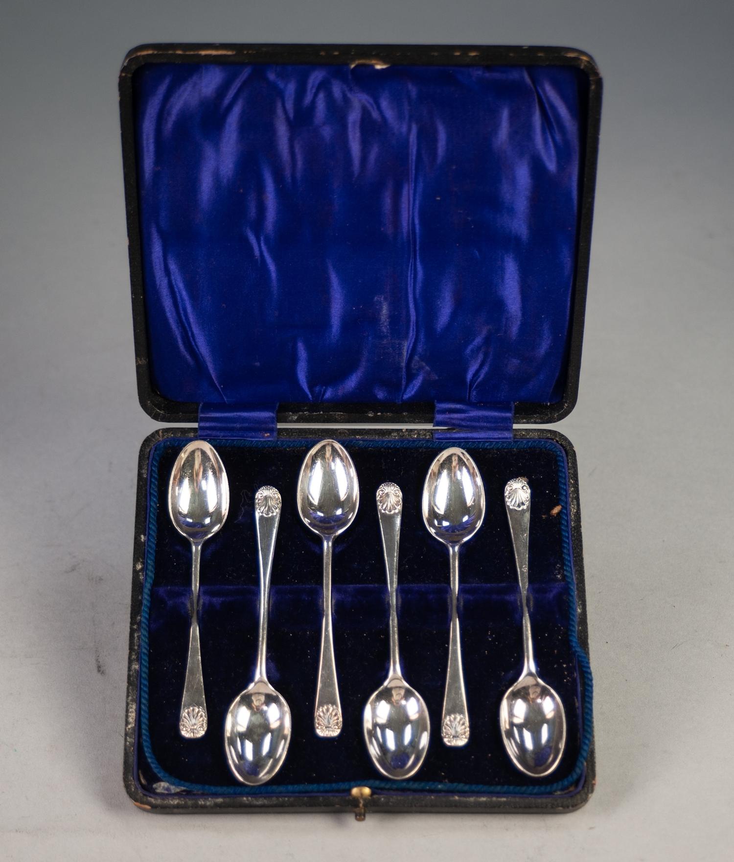 A CASED SET OF SIX SILVER TEASPOONS, with shell embossed terminals, London 1894