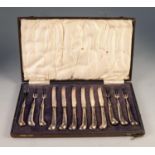BOXED SET OF SIX DESSERT KNIVES & FORKS plated metal with silver pistol grips, makers J.B. Sheffield
