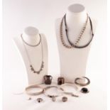 SILVER JEWELLERY, including an onyx inlaid Celtic motif bangle, two other bangles, a silver and