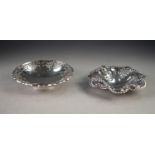 A POST WAR SILVER PIERCED BORDERED BON BON DISH, on a collet foot, by Edward Viner, Sheffield