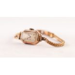 LADY'S 9ct GOLD WRISTWATCH with jewelled movement, narrow rectangular silvered arabic dial with