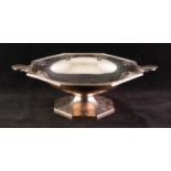 A PRE-WAR SILVER OCTAGTONAL LOW PEDESTAL BOWL, with pierced border and Art Deco style lug handles,