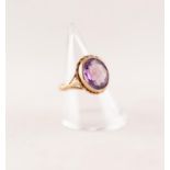 9ct GOLD AMETHYSY RING. Oval amethyst in a rope frame, to forked shoulders, ring size K1/2, 3.24g