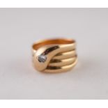 GEORGE V 18ct GOLD DIAMOND SNAKE RING. With round brilliant cut diamond set head, to a coiled shank,