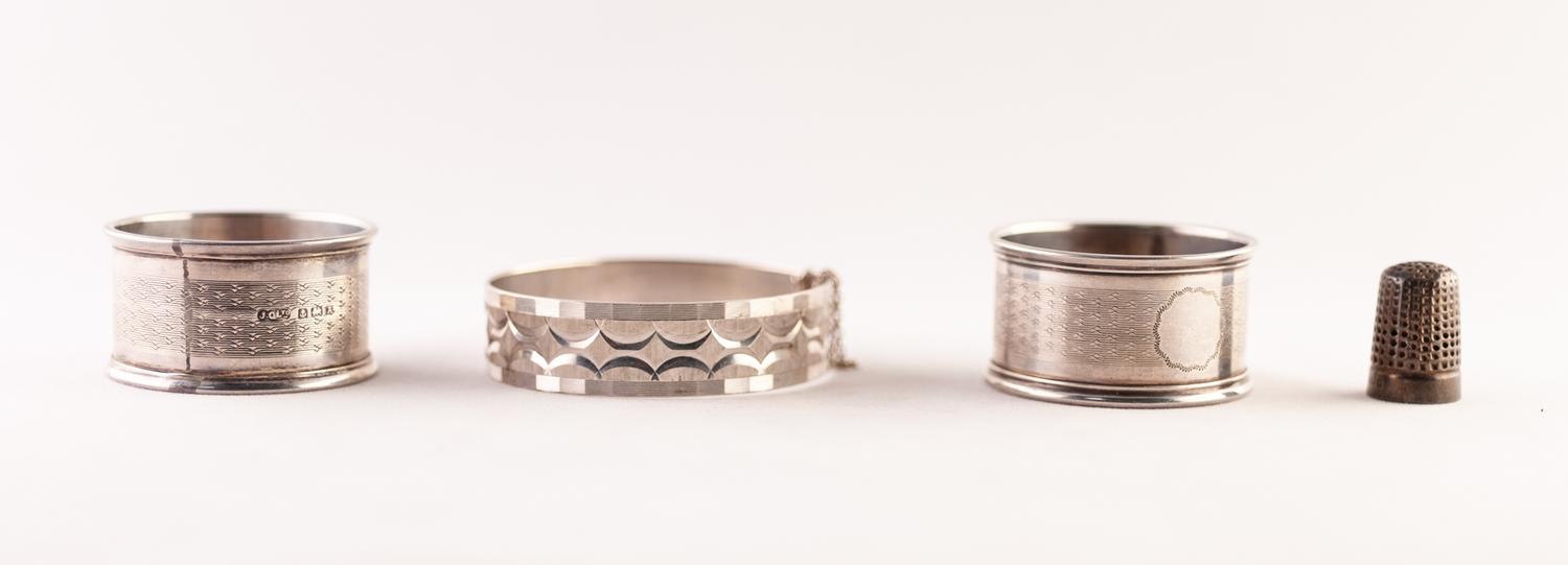 PAIR ENGINE TURNED SILVER NAPKIN RINGS, Birmingham 1925; A SILVER THIMBLE AND A SILVER BRIGHT-CUT