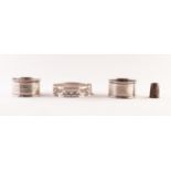 PAIR ENGINE TURNED SILVER NAPKIN RINGS, Birmingham 1925; A SILVER THIMBLE AND A SILVER BRIGHT-CUT
