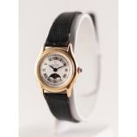 TIFFANY & CO "CONCORD"LADY'S SWISS MADE 14K GOLD WRIST WATCH, with textured, silver, circular