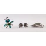 PAIR OF MARCASITE ORCHID PATTERN CLIP EARRINGS; A MARCASITE LEAF SHAPED BROOCH (pin missing) AND