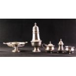 A PRE-WAR SILVER WEIGHTED SUGAR CASTOR, Birmingham 1938, also a three piece silver CONDIMENT SET,