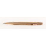 ENGINE TURNED LIFE LONG PROPELLING PENCIL, stamped '9CT GOLD', 20.73g gross Some denting