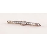 EDWARDIAN PLATINUM AND DIAMOND BAR BROOCH. Three graduated old cut diamonds to a pierced bar,