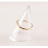 TIFFANY & CO BAND RING. Stamped '18K', ring size J, 1.98g Inner shank engraved 'Enrique'.