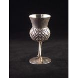 A VICTORIAN SCOTTISH SILVER THISTLE FORM SMALL GOBLET, rising from a circular base inscribed 'From