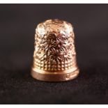 POST WAR 9ct GOLD THIMBLE size 8, Birmingham 1967, 5 gms in an EGG SHAPED BLACK LEATHER AND GILT