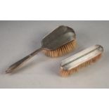 A POST WAR ENGINE TURNED SILVER BACKED HAIR BRUSHES AND MATCHING CLOTHES BRUSH