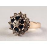 9ct GOLD DIAMOND AND SAPPHIRE THREE TIER CLUSTER RING, set with a tiny centre diamond, surround of