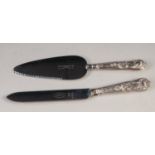 A CAKE KNIFE AND TART SLICE, with Kings Pattern embossed handles (2)